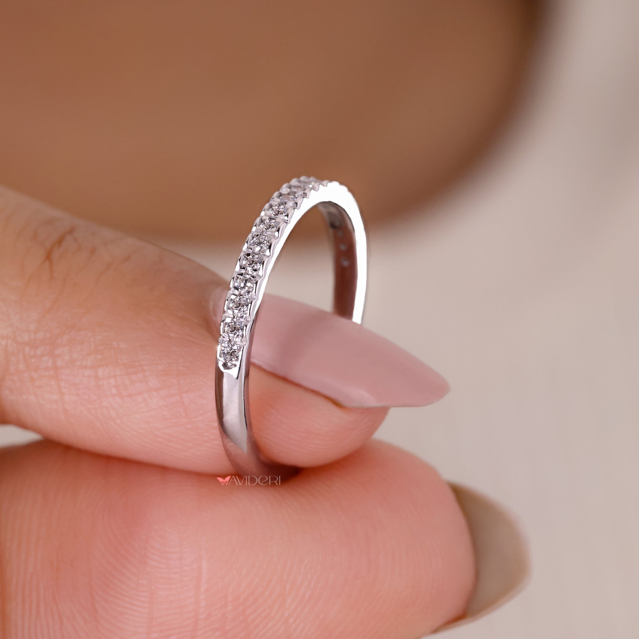 Handmade custom wedding band featuring lab grown diamonds by Avideri.
