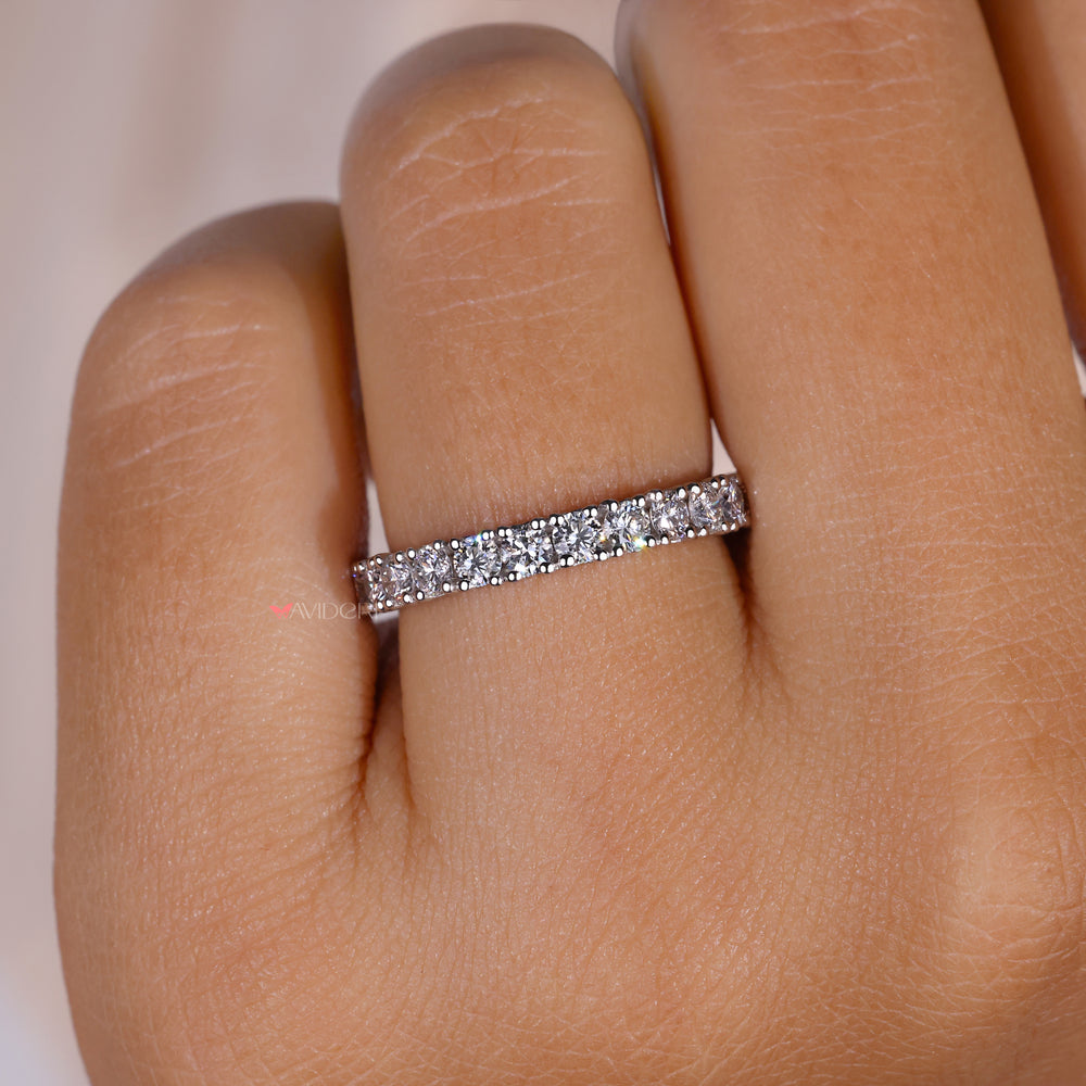 Lab grown custom wedding band with round diamonds.