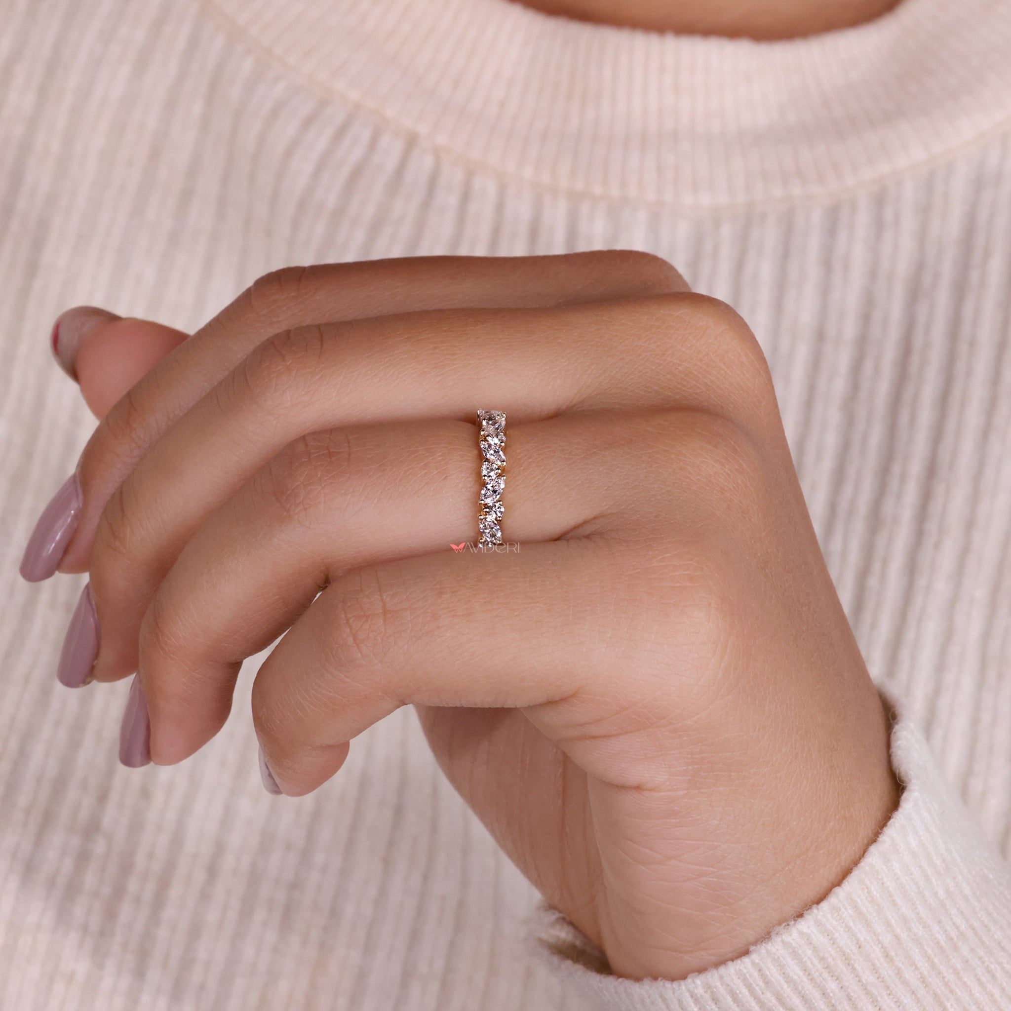 IGI certified marquise wedding band with sparkling diamonds for elegance.
