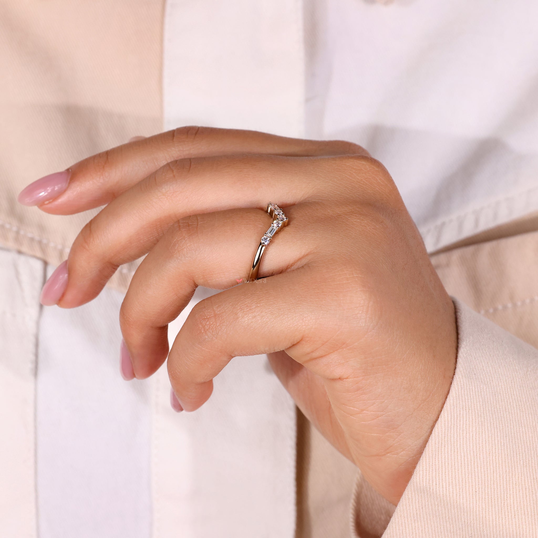A radiant round diamond wedding band, designed for a timeless and elegant look.
