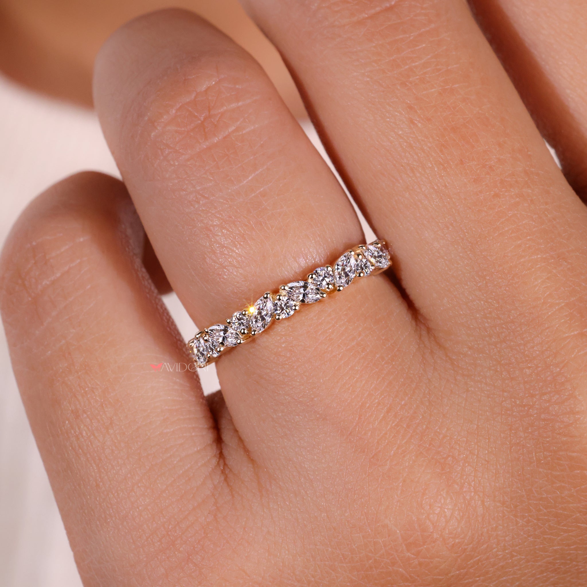 Round wedding band with marquise wedding band set for a perfect pairing.

