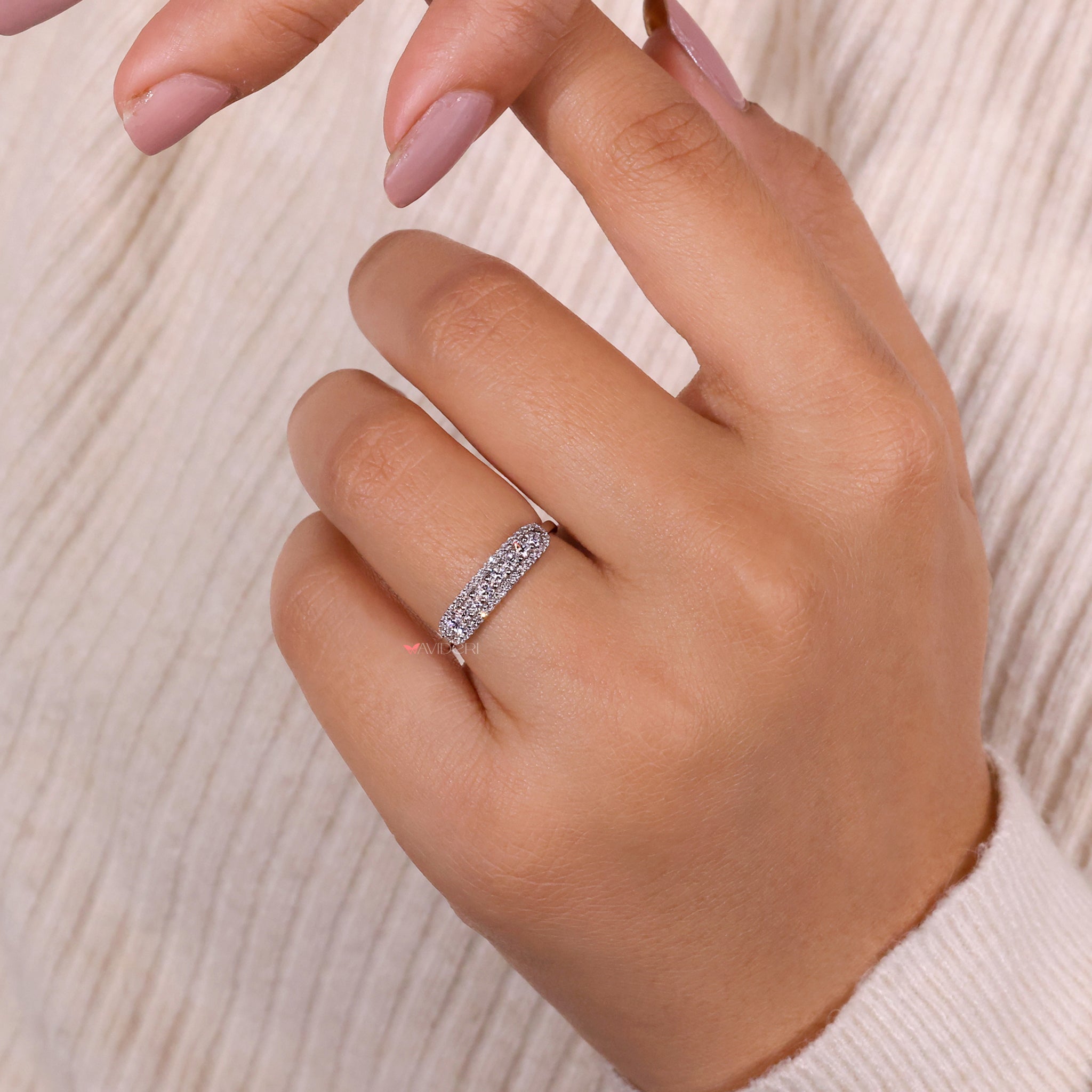 Handmade jewelry featuring lab-created diamond bands.
