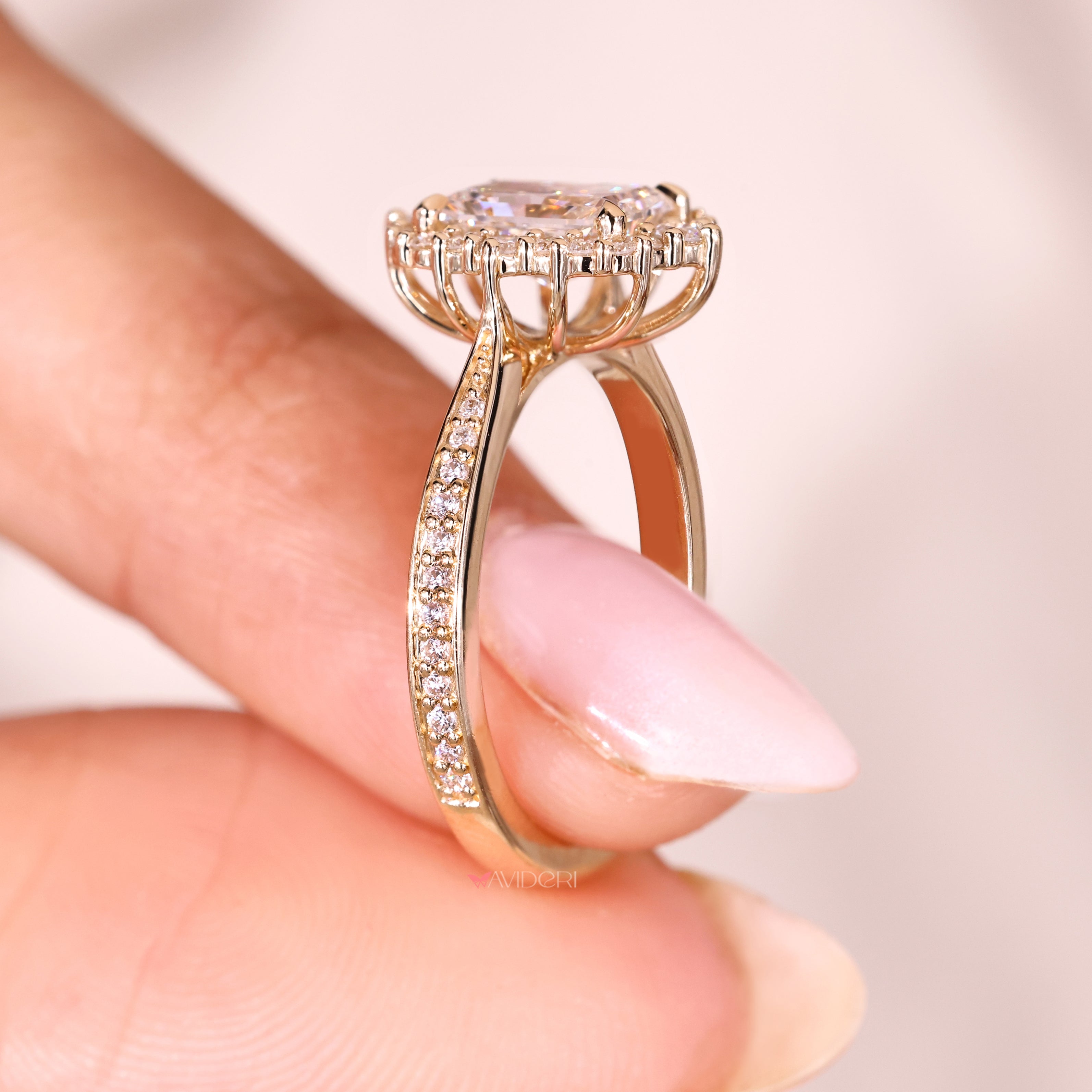 Radiant cut ring with tapered shank cathedral.
