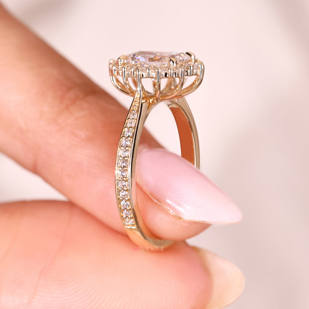 Radiant cut ring with tapered shank cathedral.
