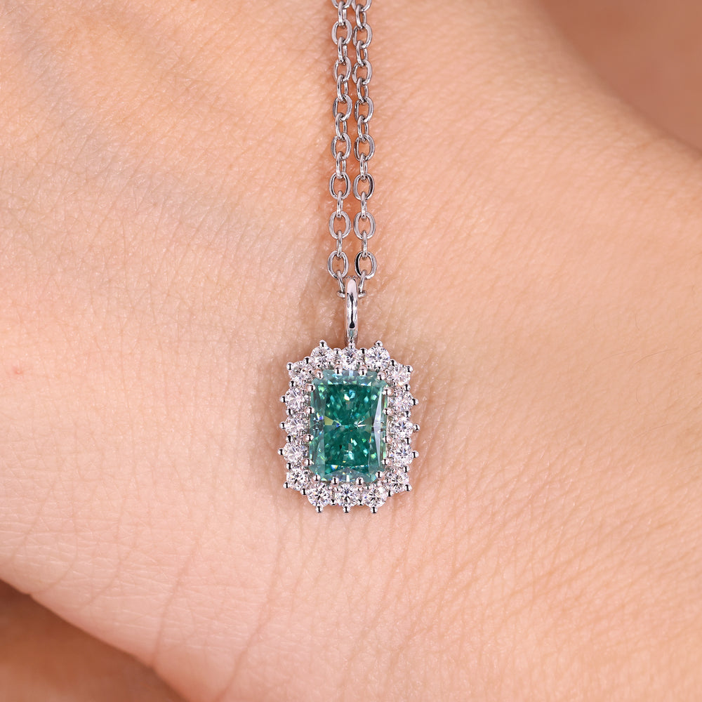 Minimal radiant cut cyan blue moissanite pendant.
