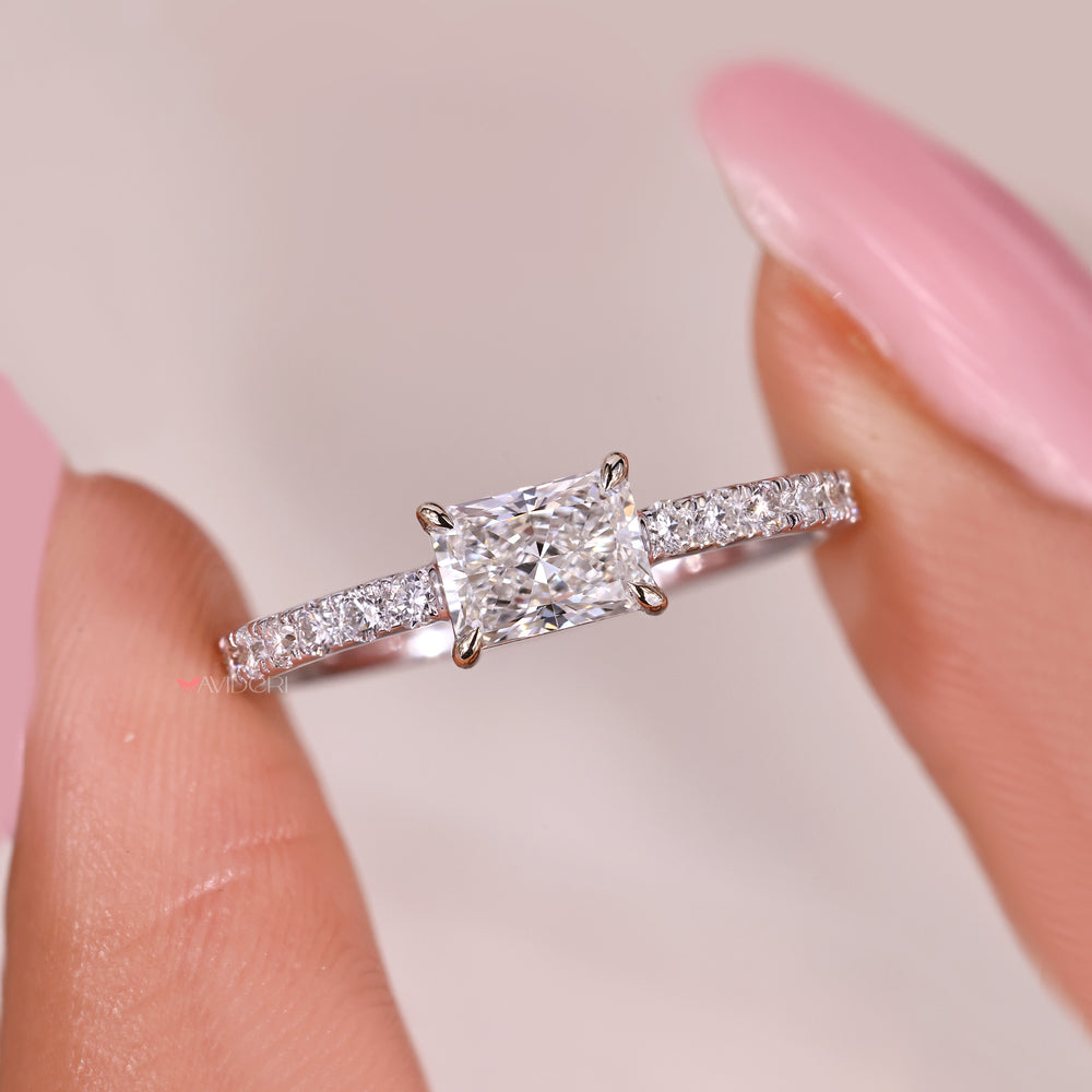Handmade radiant cut diamond ring east west style.