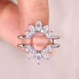 Marquise and pear moissanite ring enhancer band.
