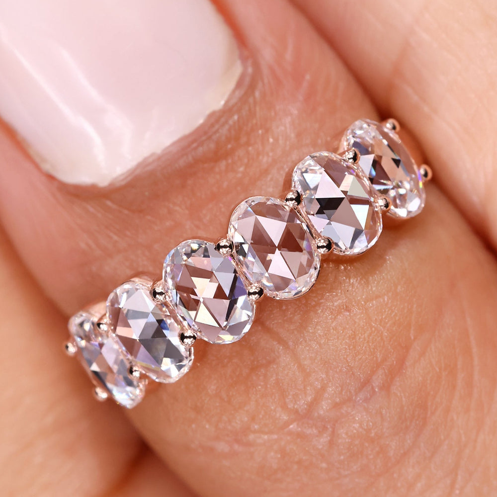 Oval rose cut diamond wedding band in rose gold.