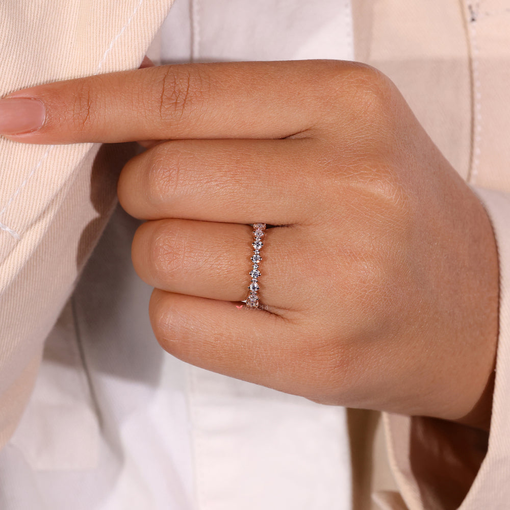 Rose gold band with a smooth, polished surface.

