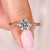 Round cut diamond ring in classic solitaire style.
