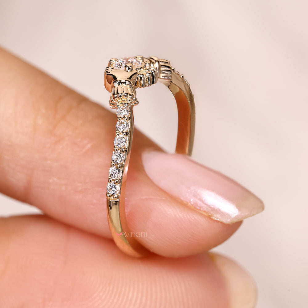 Round diamond ring with tapered shank style.
