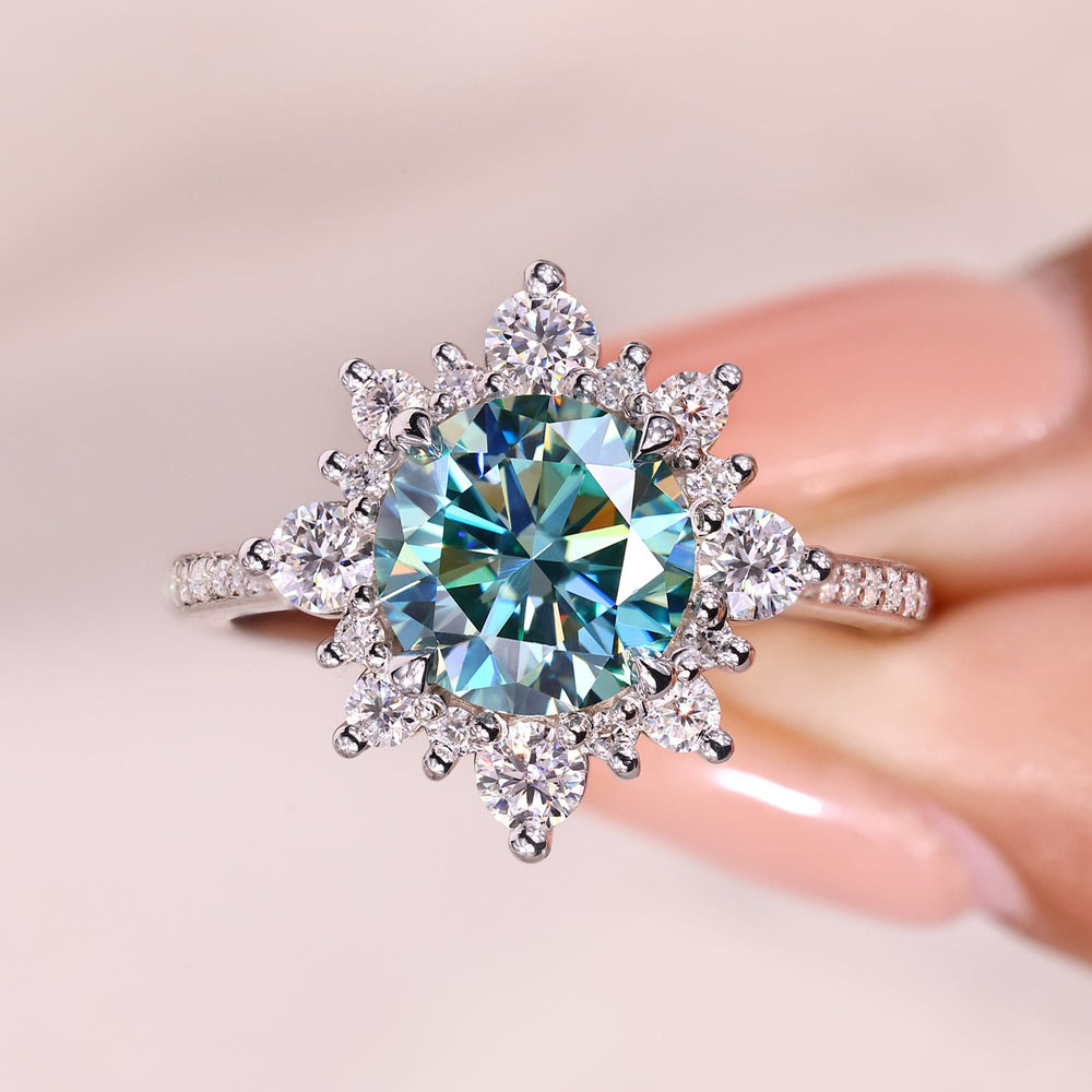 Elegant cyan blue moissanite cluster ring.
