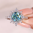 Elegant cyan blue moissanite cluster ring.
