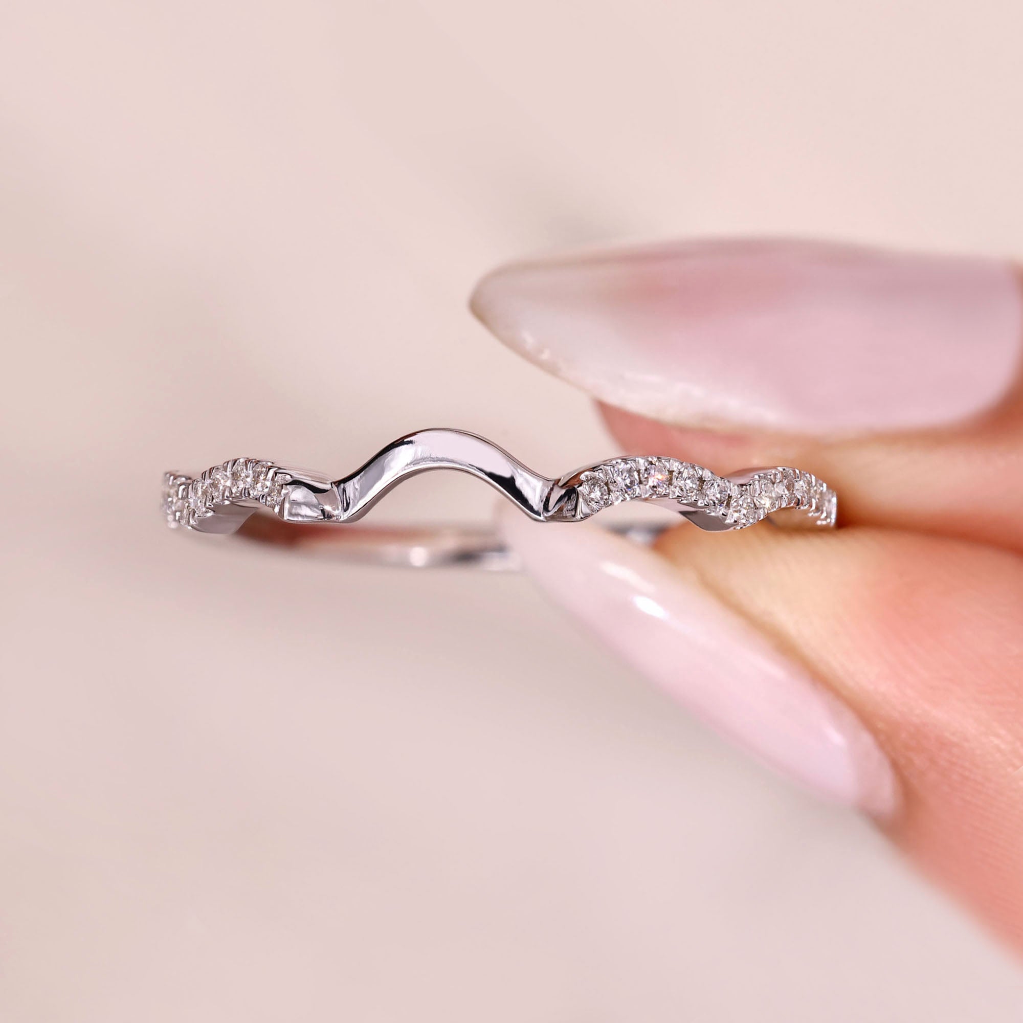 Curved diamond band perfect for stacking rings.
