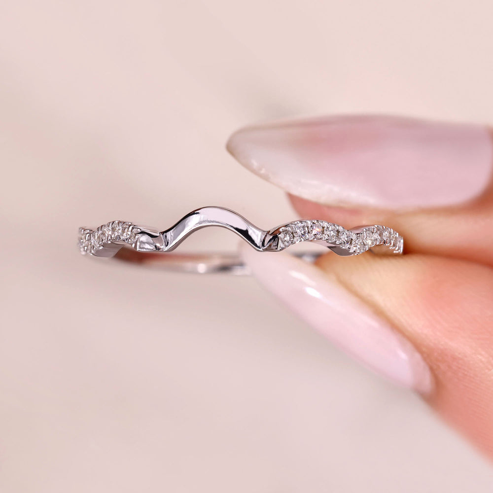 Curved diamond band perfect for stacking rings.
