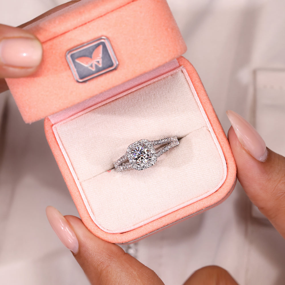 Handmade round ring with four prong setting.
