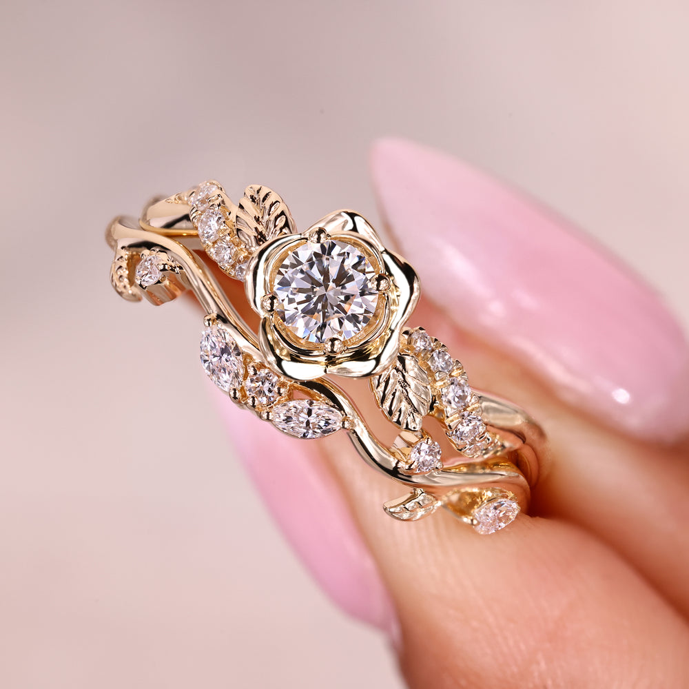 Round diamond ring with marquise diamond stackable band.