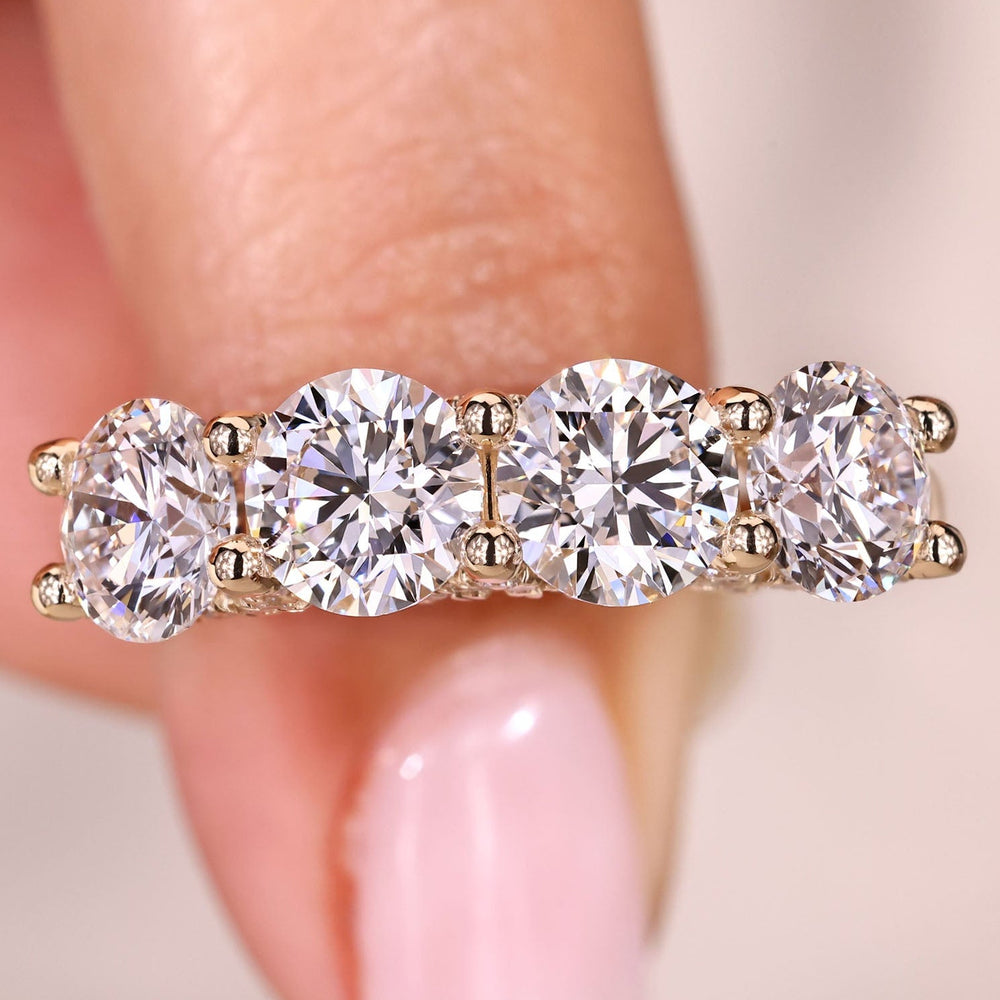 Round diamond wedding band in half eternity style.

