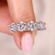Round diamond wedding band in half eternity style.
