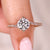 Round diamond engagement ring with pave style band.
