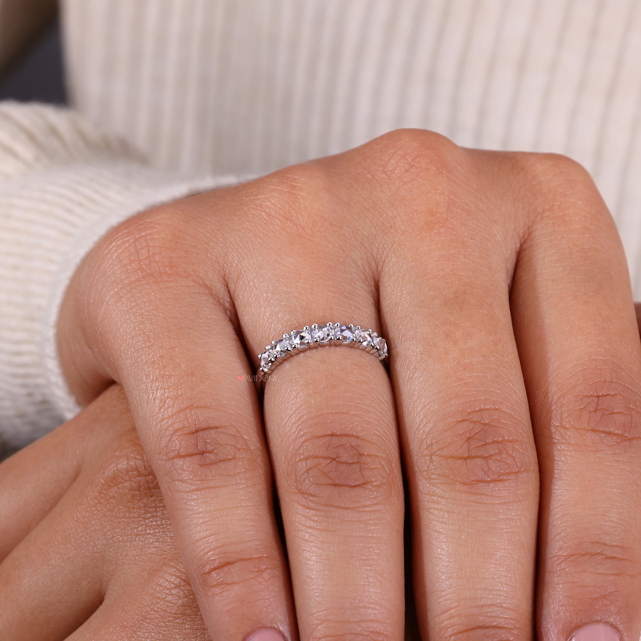 Stunning 7 stone wedding band with diamonds for a bold, elegant look.
