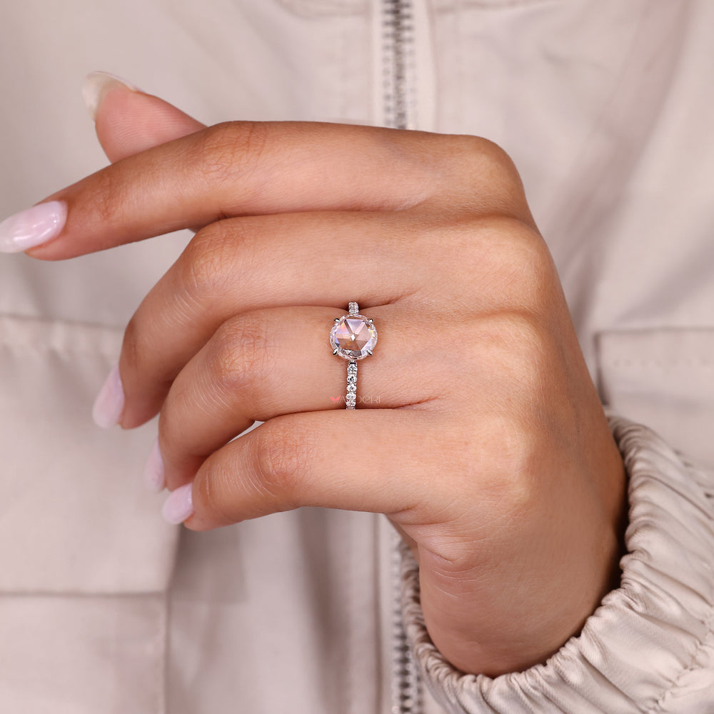 Round rose cut diamond ring with four claw prong setting.
