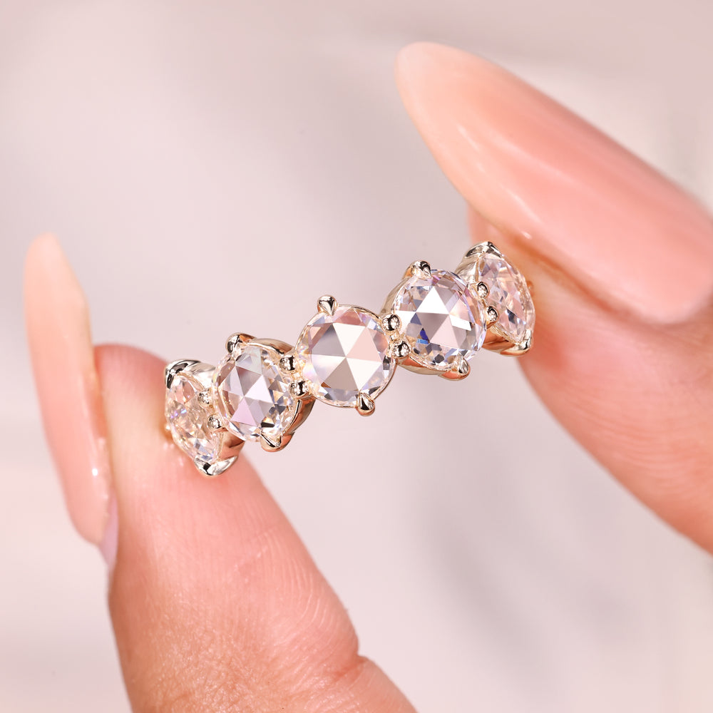 Five stone rose cut diamond wedding band.
