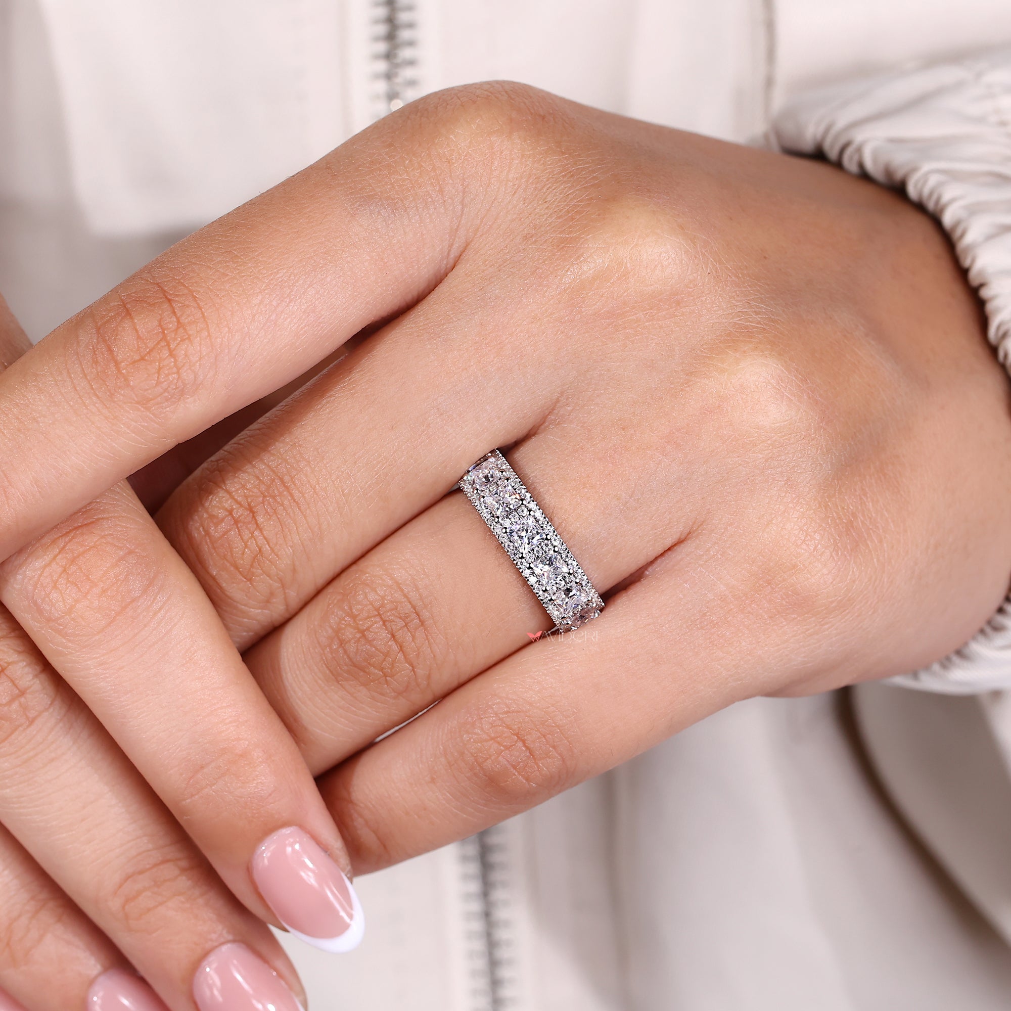 Handmade Avideri white gold wedding band.