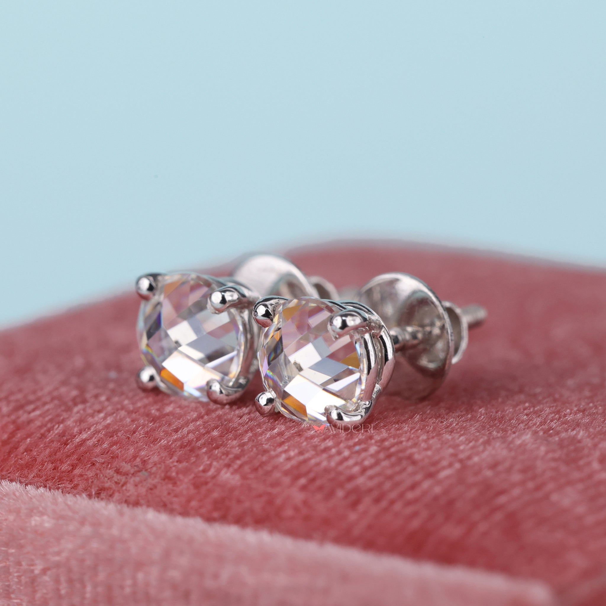 Handmade earrings show fine craftsmanship and detail.