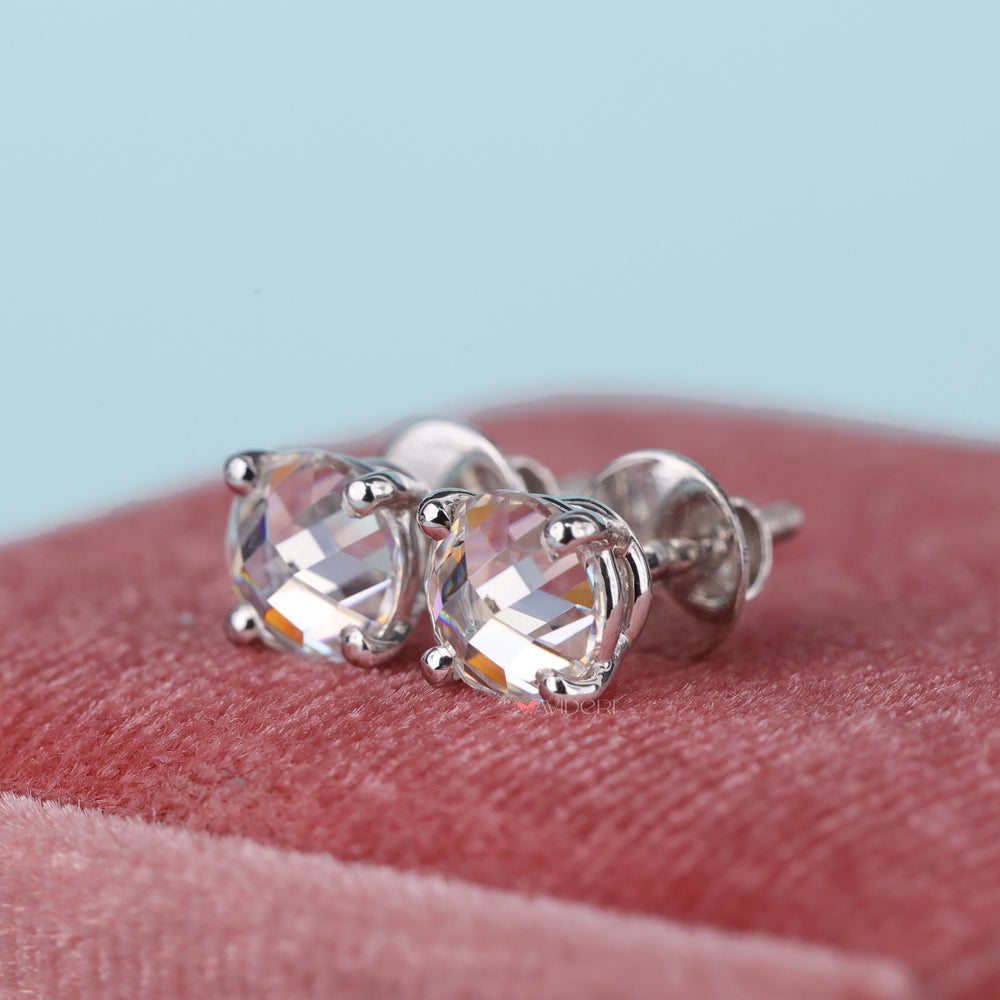 Handmade earrings show fine craftsmanship and detail.