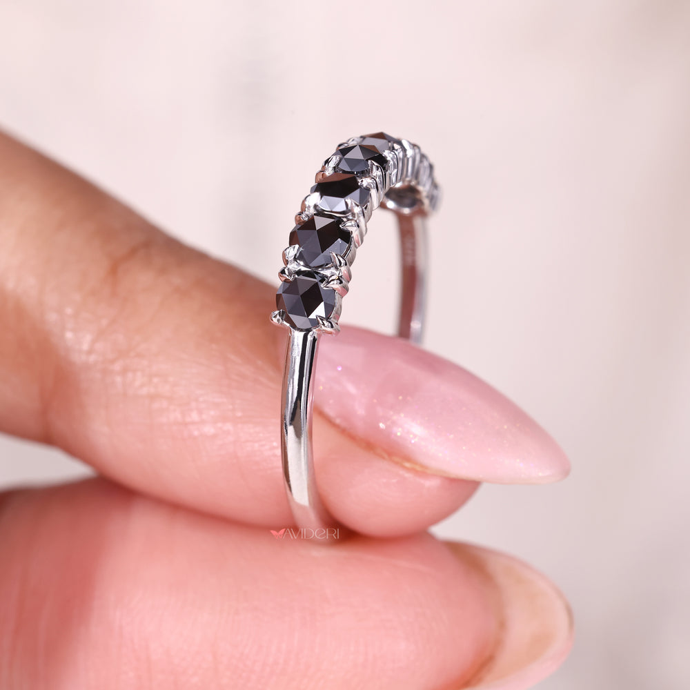 A moissanite white gold band combines brilliance with elegance.