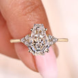 Seven stone diamond ring with coffin cut center stone.