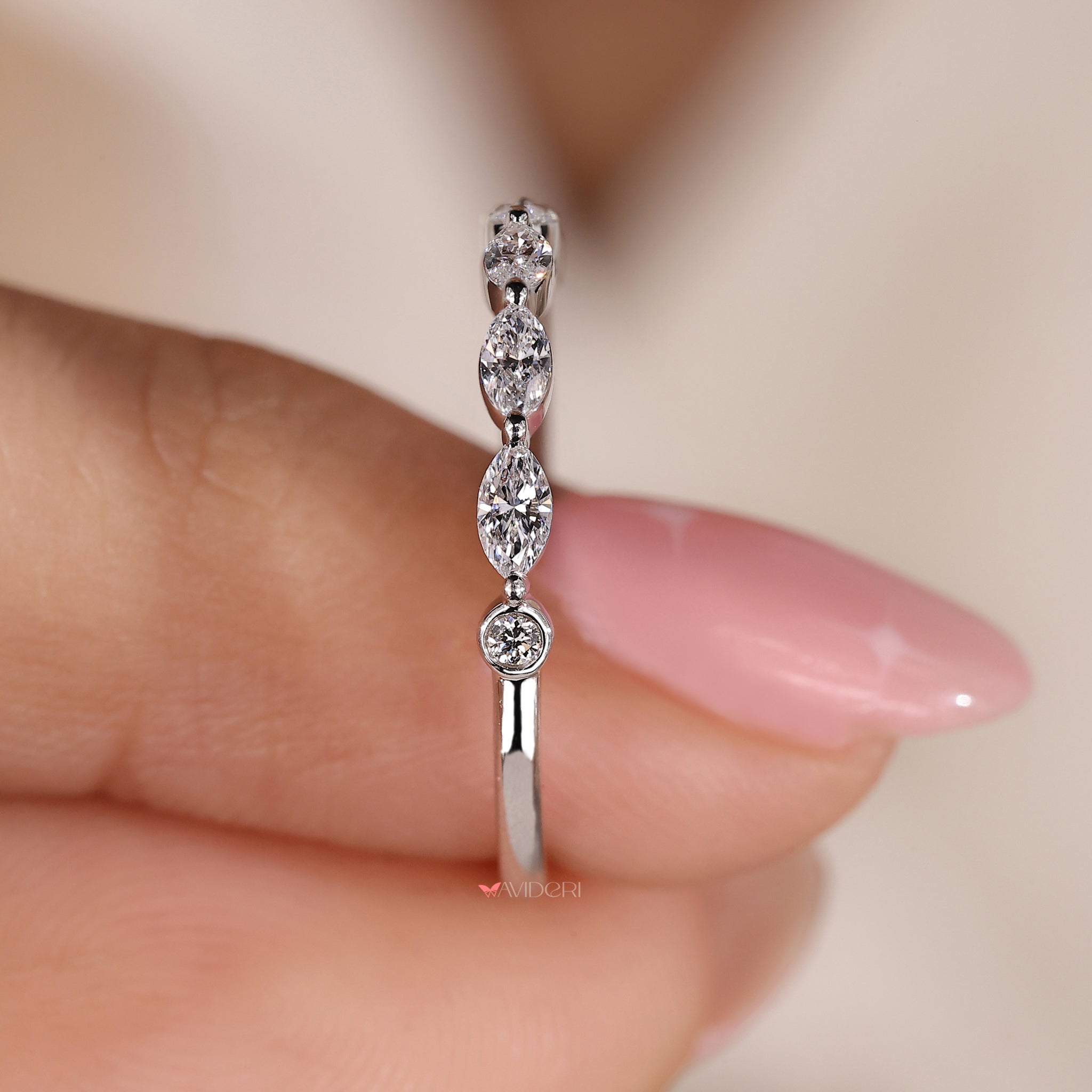 Shared Prong band showcasing marquise diamonds with a secure and elegant setting
