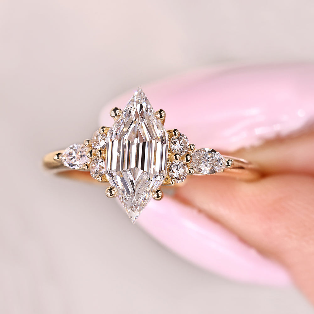 Cathedral style engagement ring with hexagon center diamond design

