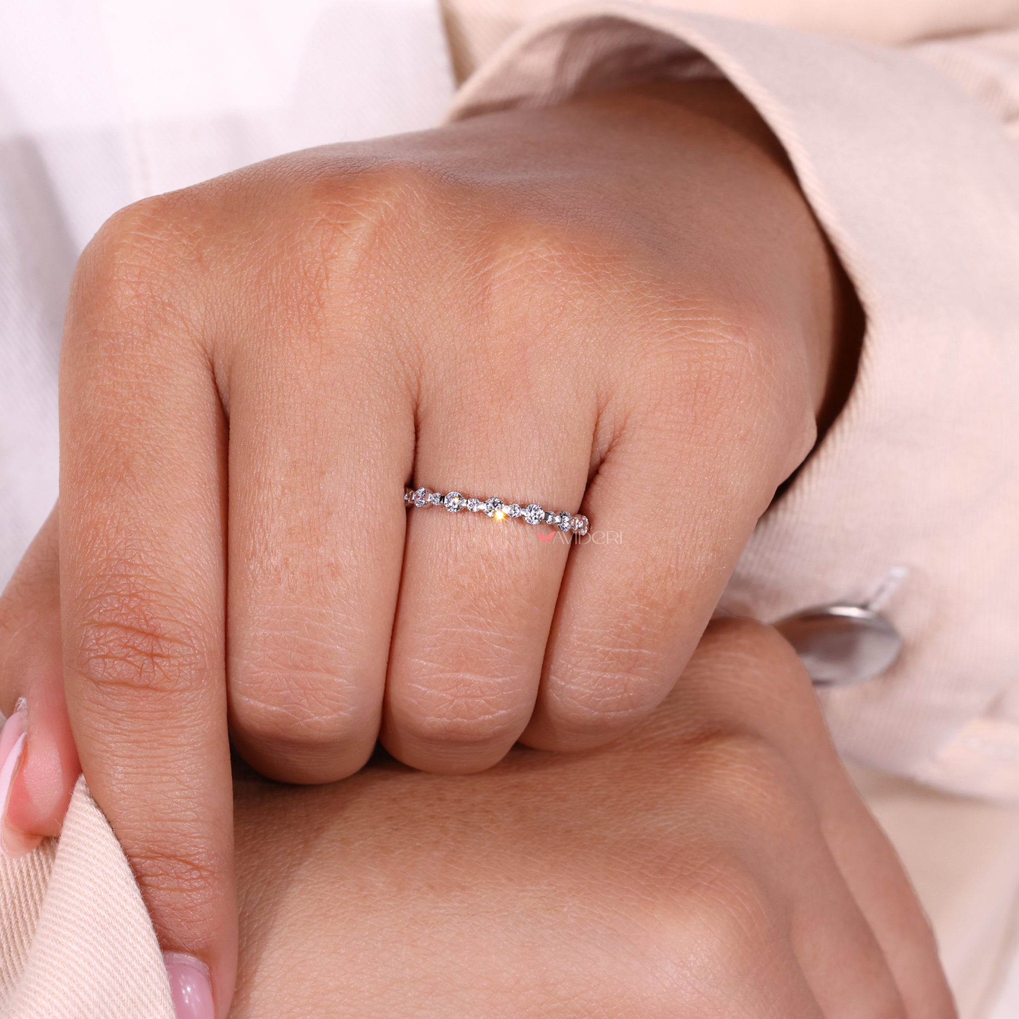 An igi-certified wedding band featuring ethically sourced diamonds for peace of mind.
