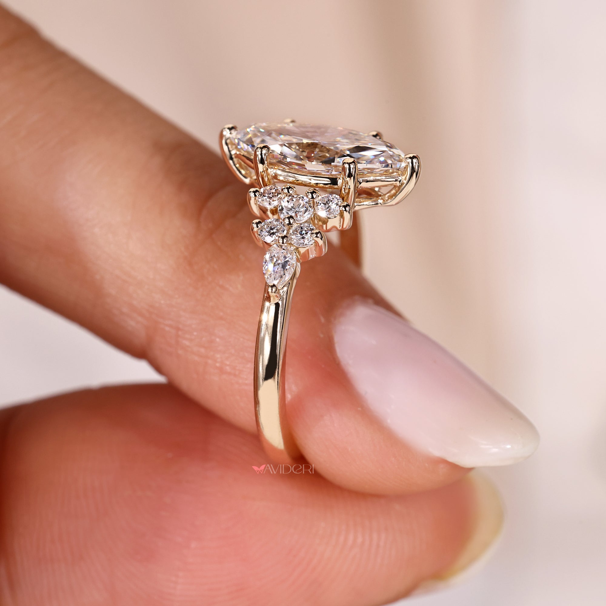 Pear and Round Diamond Side Stone handmade jewelry.