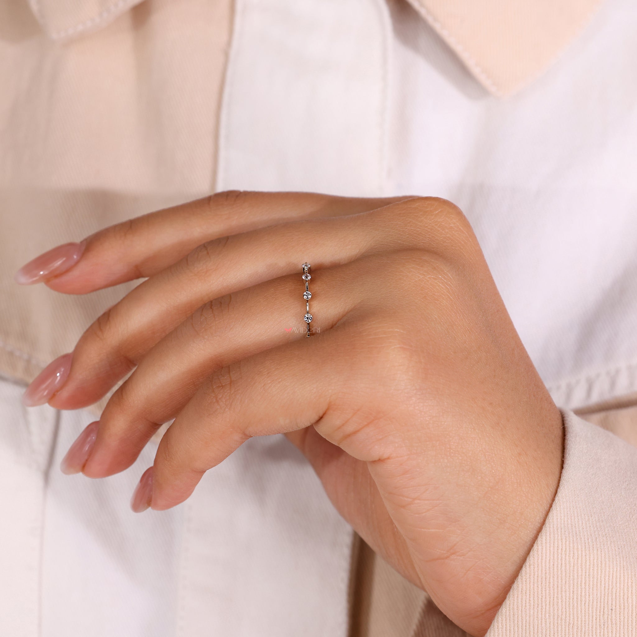 Handmade jewelry featuring a timeless eternity wedding band.
