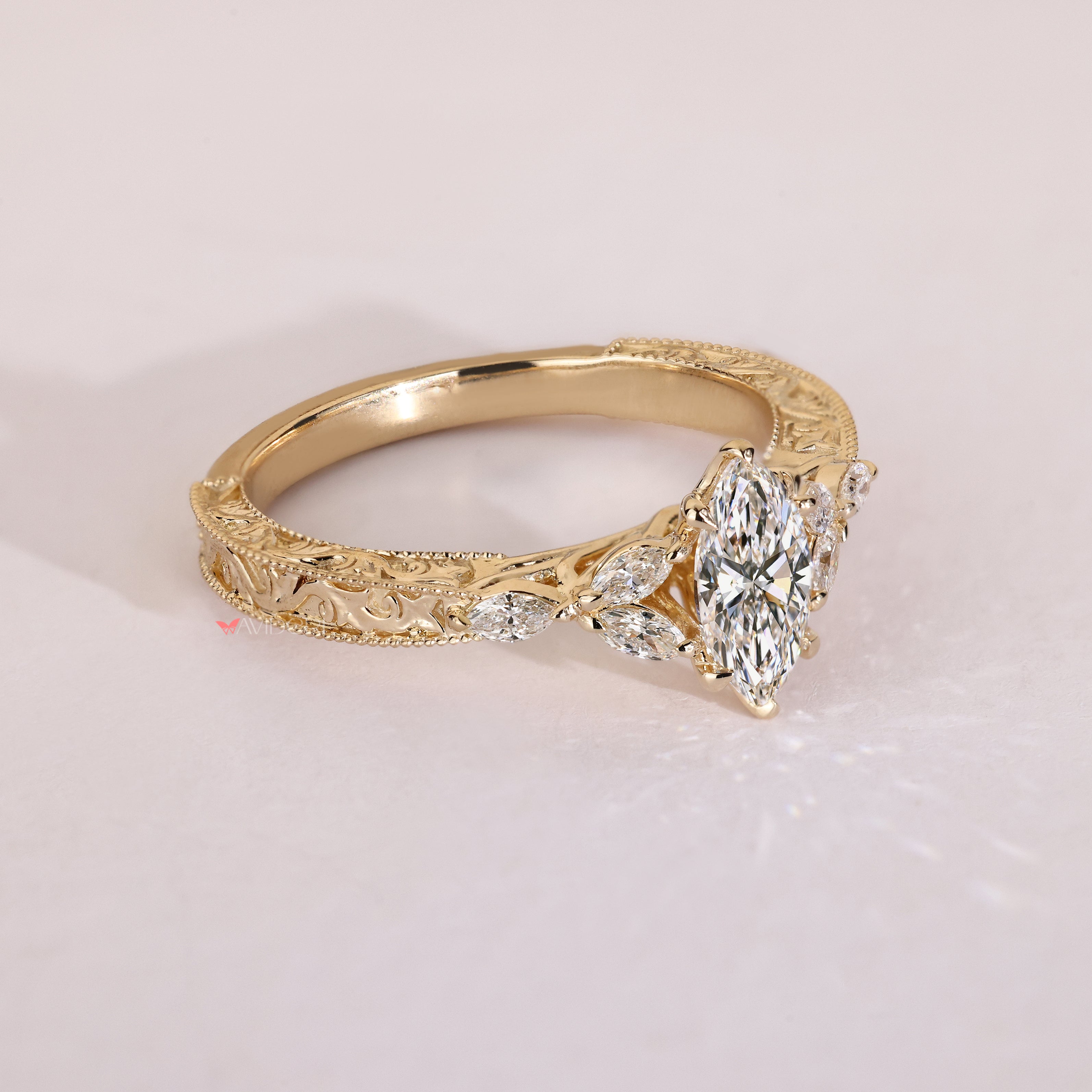 Vintage marquise ring with small side stones.
