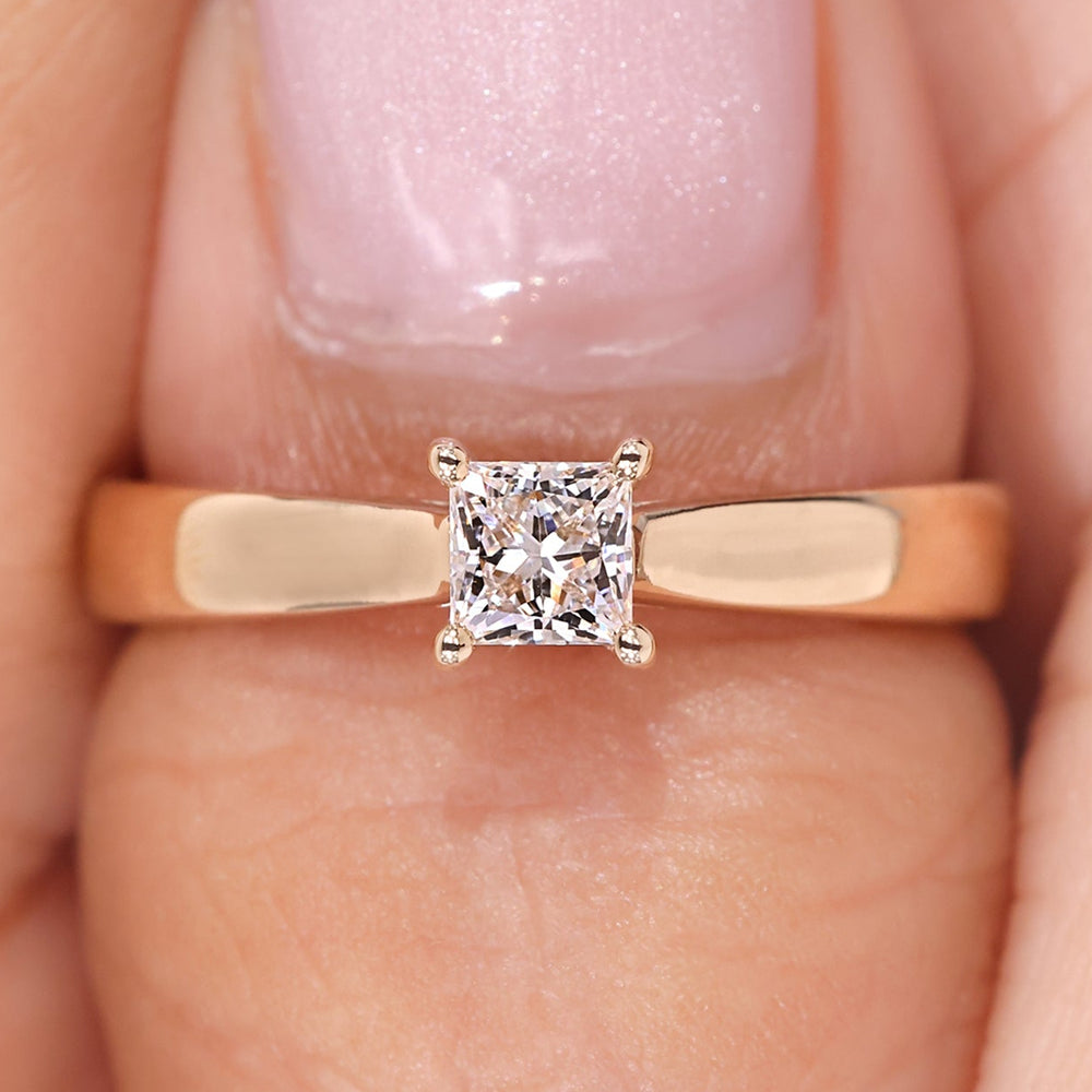 Princess diamond engagement ring in a four-prong setting, designed for a simple and clean look.