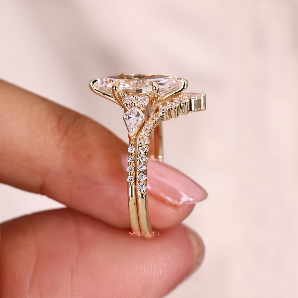 Marquise ring with muse setting tapered shank.
