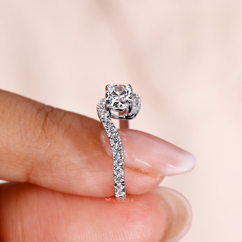 Classic round diamond engagement ring with a radiant centre stone.
