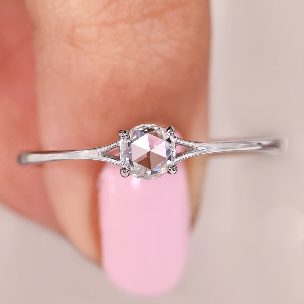 Solitaire diamond ring in 4 claw prong setting.