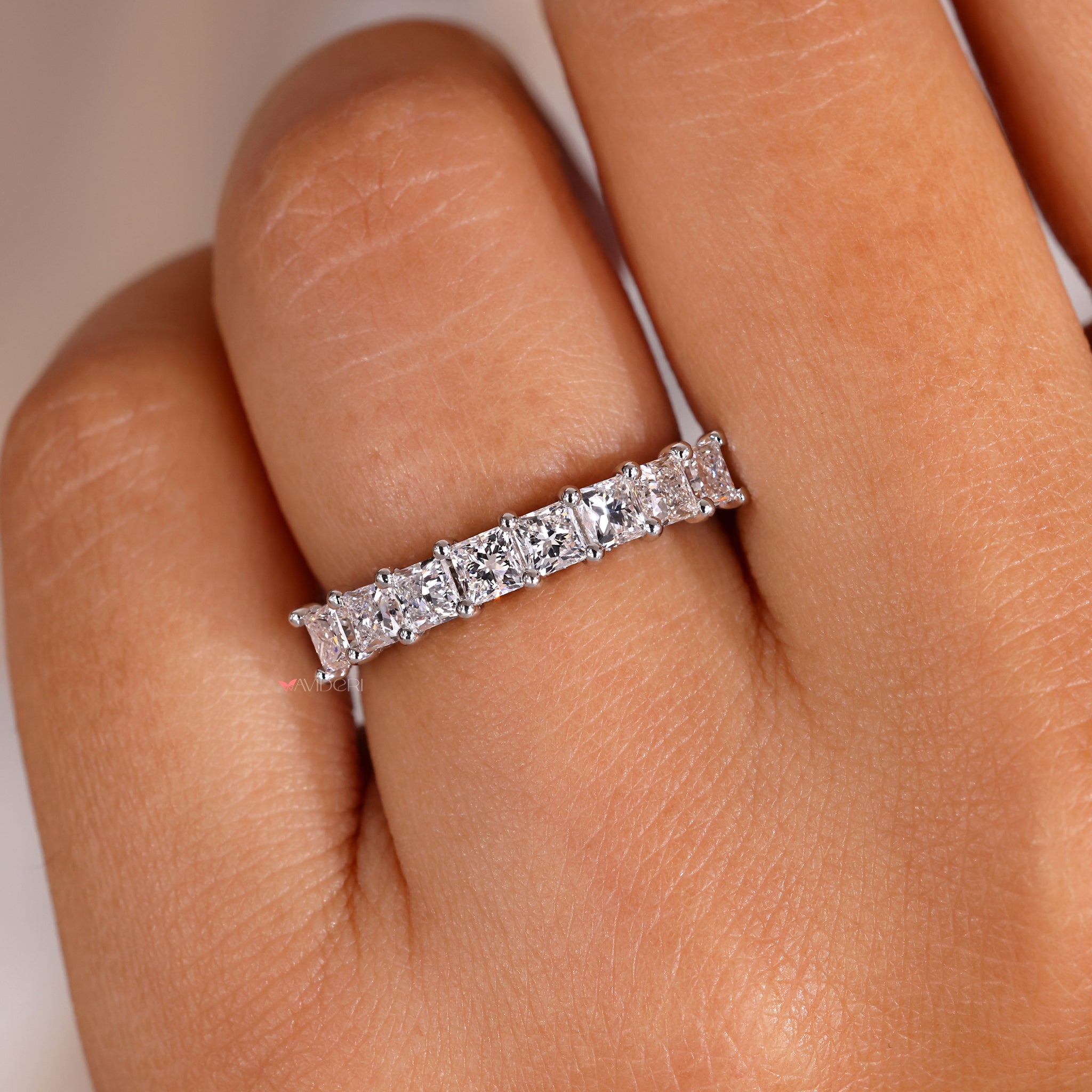 Designed to accentuate a princess cut diamond ring, the ideal wedding band for it is this one.
