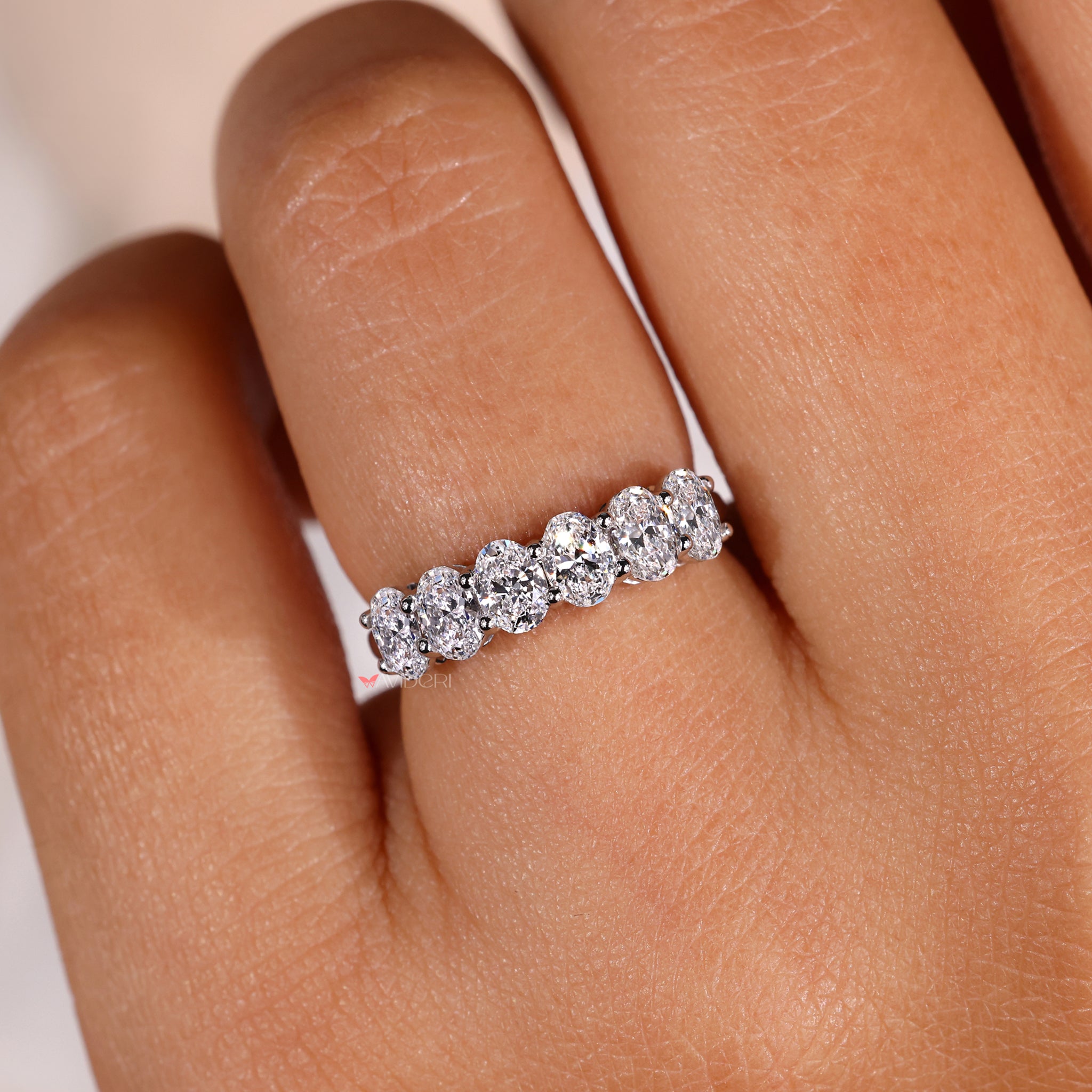 Unique matching wedding band designed to complement solitaire rings

