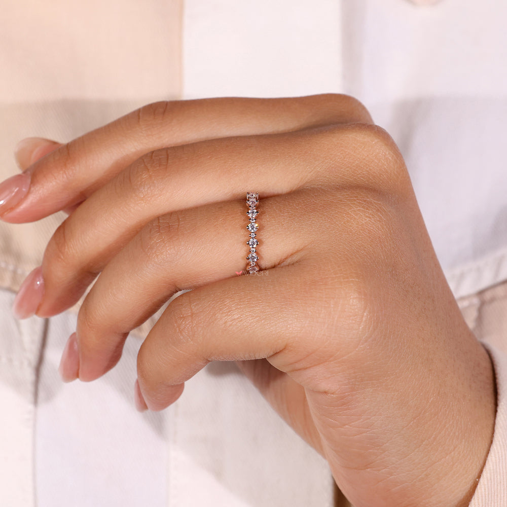 Unique rose gold wedding band with custom design.
