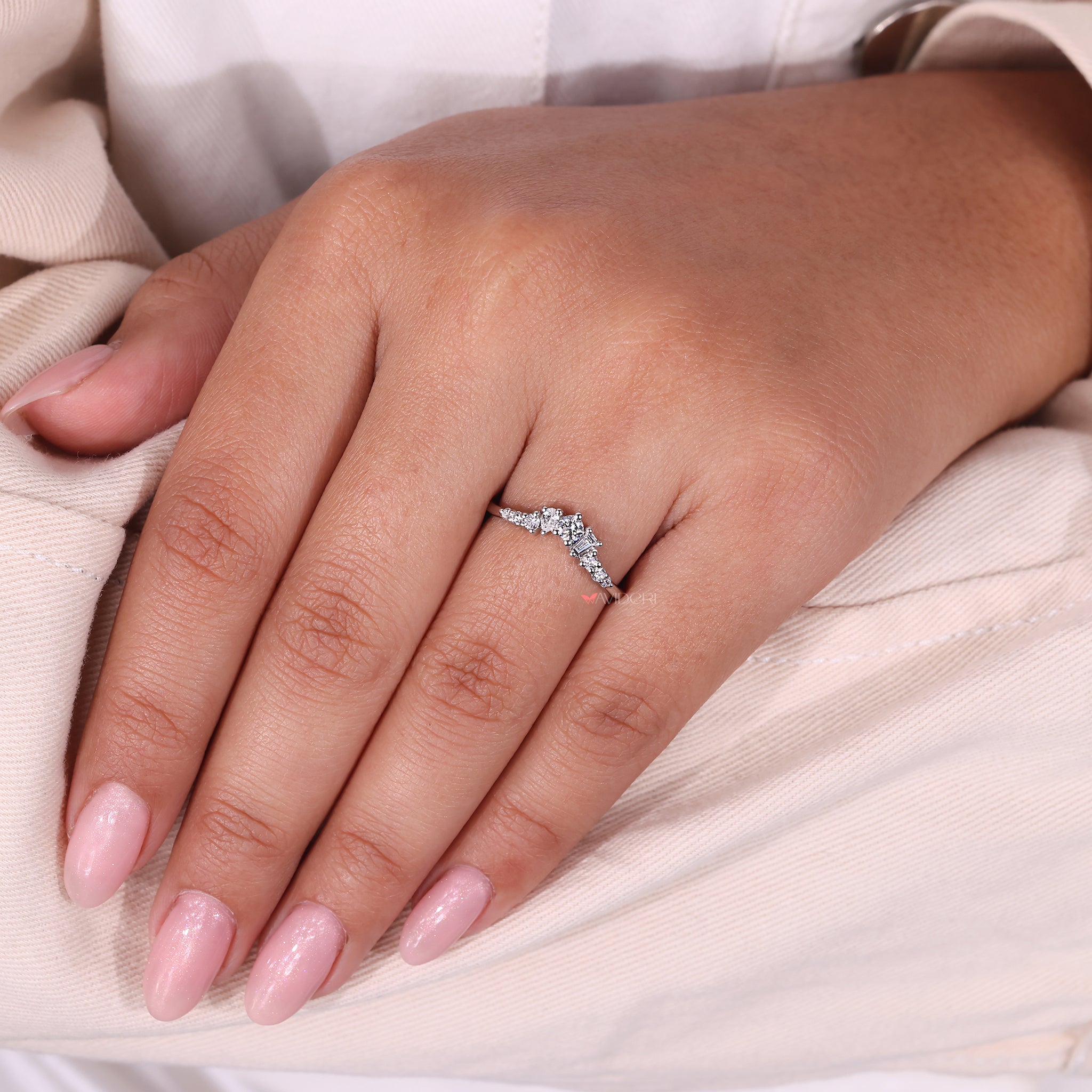 A pear diamond band offers a sleek, unique design.