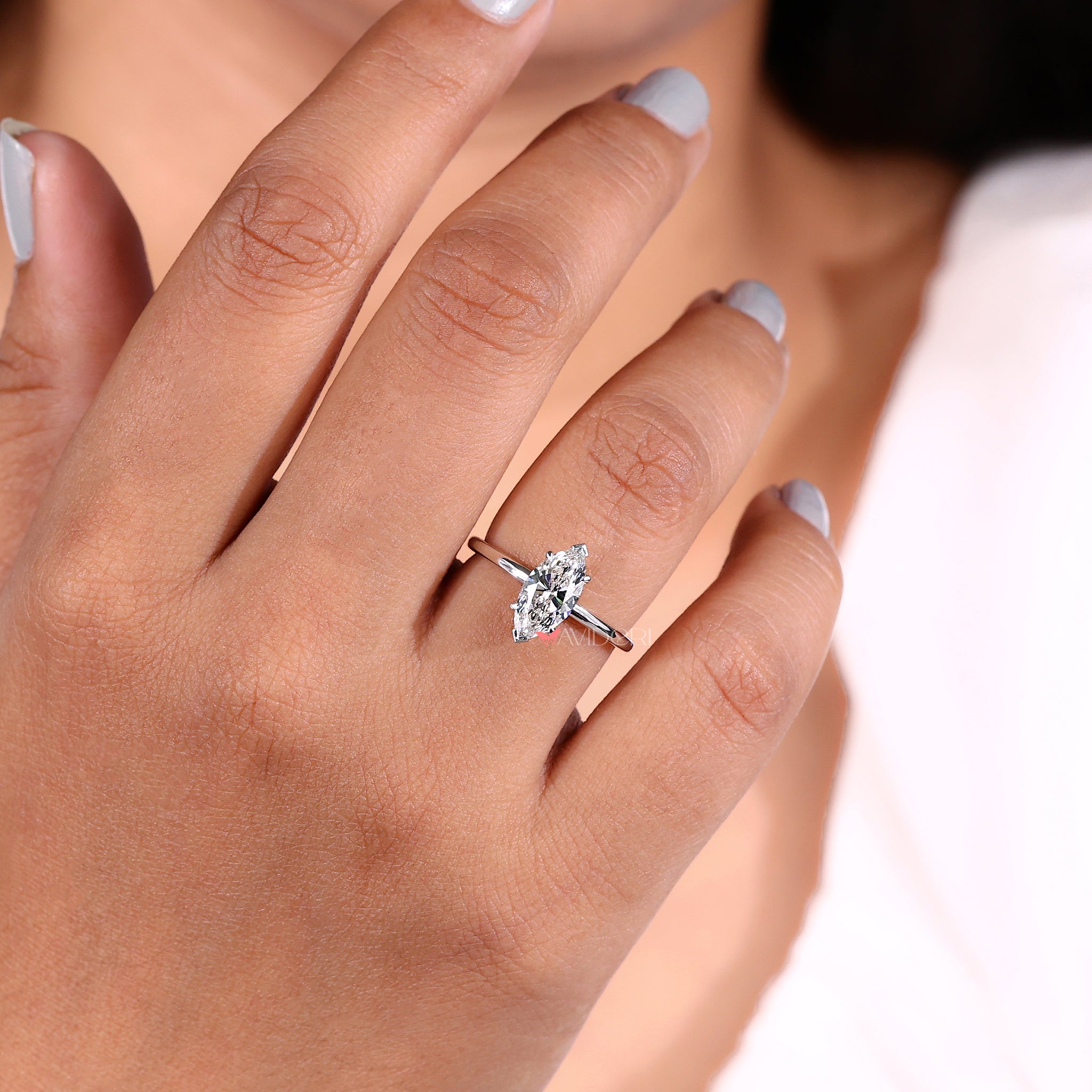 Elegant marquise v prong design with Lab Grown Diamond in a handmade ring for unique engagement moments.
