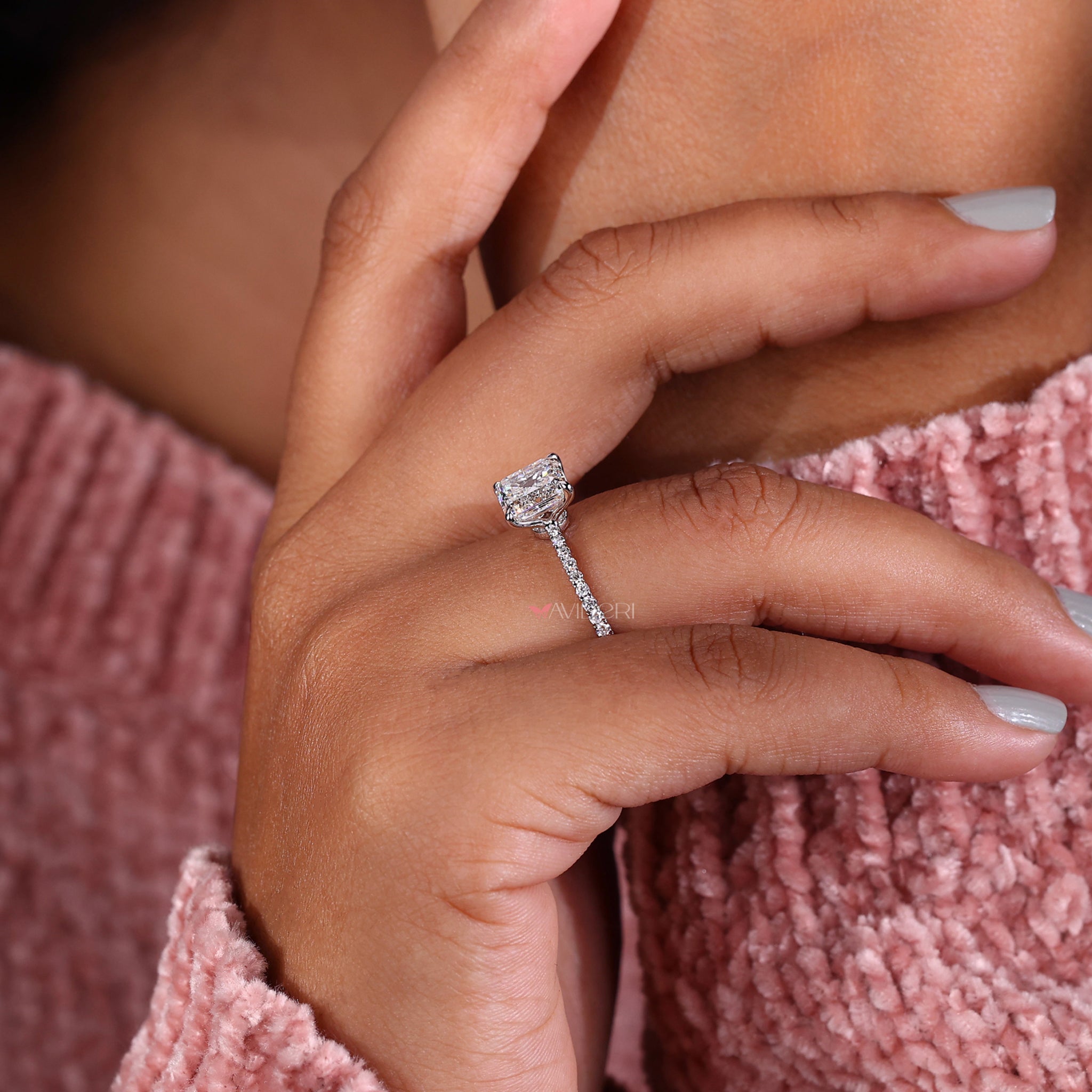 Handmade jewelry designed as a stunning asscher engagement ring with a modern prong setting for secure elegance.
