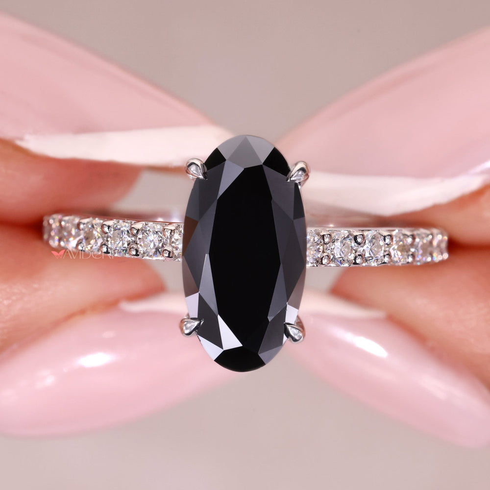 Movel shaped engagement ring with a delicate and modern design.
