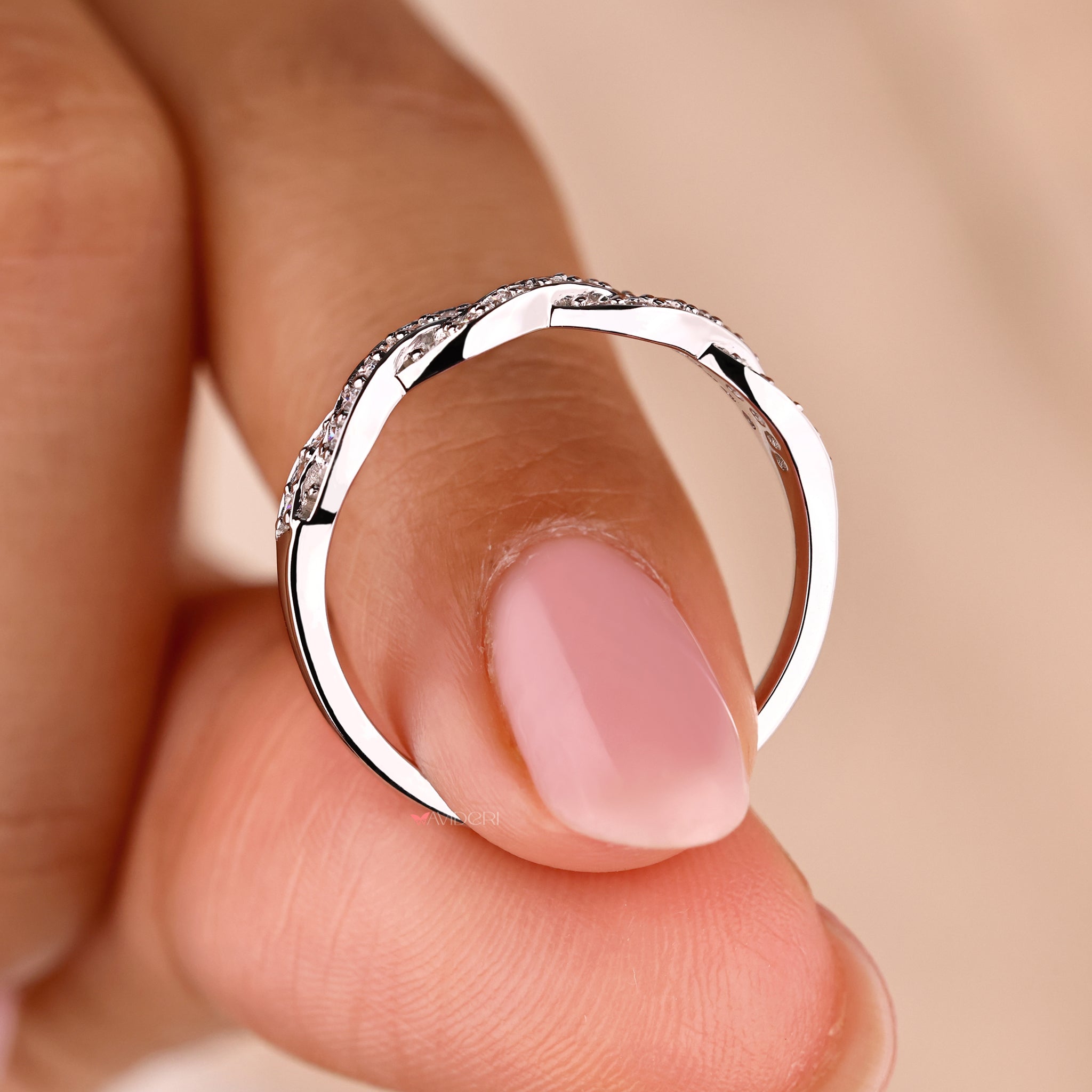 White gold band with a sleek, polished finish.
